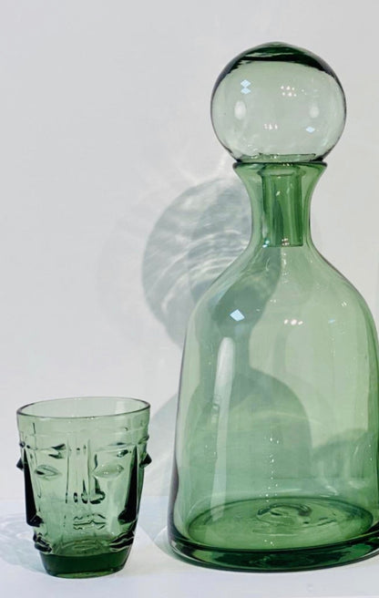 Verre visage vert